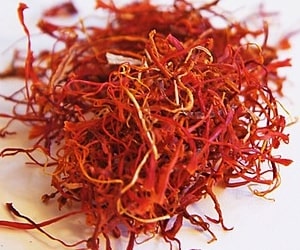 Herbs and Spices Saffron. Saffron (Crocus sativus) is a highly prized and aromatic spice derived from the dried stigmas of the saffron crocus flower. Known for its vibrant color, distinct flavor, and unique aroma, saffron is one of the most expensive spices in the world. Here are some key points about saffron:

Key Features:
Color:

Saffron imparts a bright golden-yellow to orange-red color to dishes.
Flavor Profile:

Saffron has a complex flavor that is floral, slightly sweet, and often described as hay-like or metallic.
Aroma:

Saffron has a distinct and fragrant aroma that is released when it is steeped or infused.
Culinary Uses:
Coloring Agent:

Saffron is used to add a rich yellow color to a variety of dishes, including rice, paella, and certain desserts.
Flavoring:

It imparts its unique flavor to both sweet and savory dishes, such as saffron-infused rice, risottos, and certain breads.
Beverages:

Saffron is used to flavor beverages, including teas and infusions.
Saffron Threads:
Saffron is typically sold in thread form, consisting of the dried stigmas of the crocus flower. These threads are delicate and should be handled with care.
Harvesting and Production:
Crocus Flower:

Saffron is derived from the flower Crocus sativus. Each flower produces three red stigmas, which are the saffron threads.
Hand Harvesting:

Harvesting saffron is a labor-intensive process as the delicate threads must be hand-picked from each flower.
Quality Grading:
Saffron quality is often graded based on factors such as color, flavor, and aroma. The highest quality is often labeled as "Category I" or "Grade A."
Health Benefits:
Saffron contains compounds like crocin and safranal, which are believed to have antioxidant and anti-inflammatory properties.

Some studies suggest potential health benefits, including mood enhancement and potential anti-depressant effects, though more research is needed.

Usage Tips:
Infusion: To release the flavor and color, saffron threads are often infused in warm liquid (water, milk, or broth) before being added to a recipe.

Quantity: Due to its potency, only a small amount of saffron is needed to flavor and color dishes.

Storage:
Store saffron threads in an airtight container in a cool, dark place to preserve their flavor and color.
Saffron's unique combination of flavor, aroma, and color makes it a coveted spice in various culinary traditions. While it is expensive, a little saffron goes a long way, making it a prized addition to dishes that benefit from its distinct characteristics.
