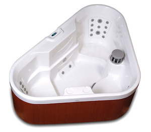 The jacuzzi is a luxurious addition to any hotel room, offering guests the perfect way to unwind after a long day of travel or sightseeing. 

This particular 3-seater jacuzzi is designed to accommodate up to three people, making it ideal for couples or small families. 

The soothing jets and warm water create a relaxing atmosphere that is sure to leave guests feeling refreshed and rejuvenated.